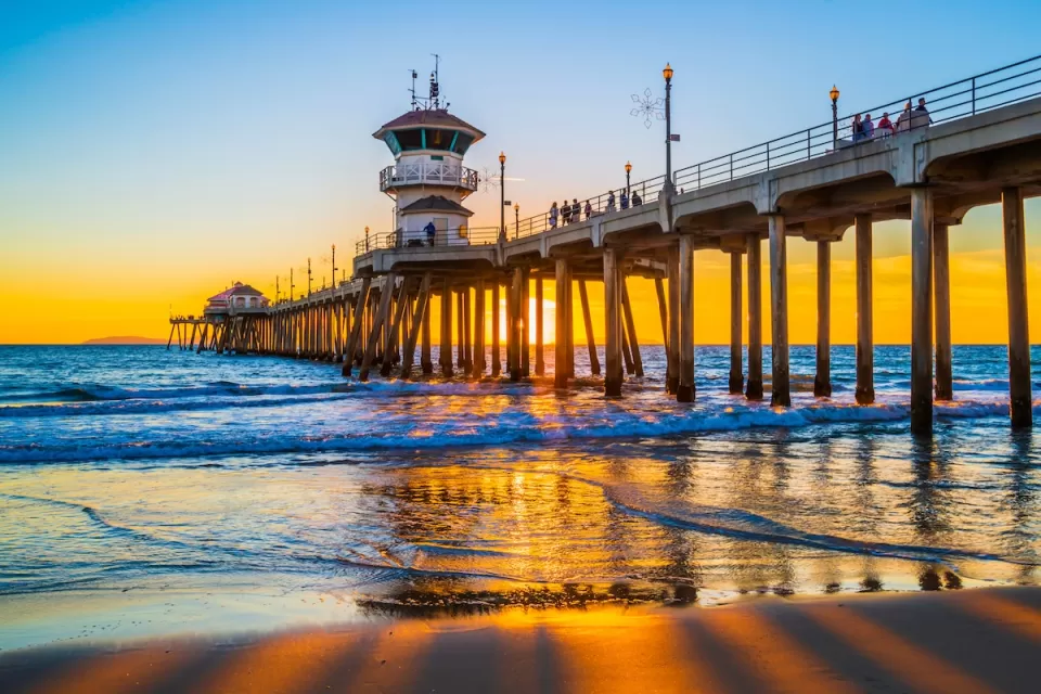 Huntington Beach, CA pier at sunset.
